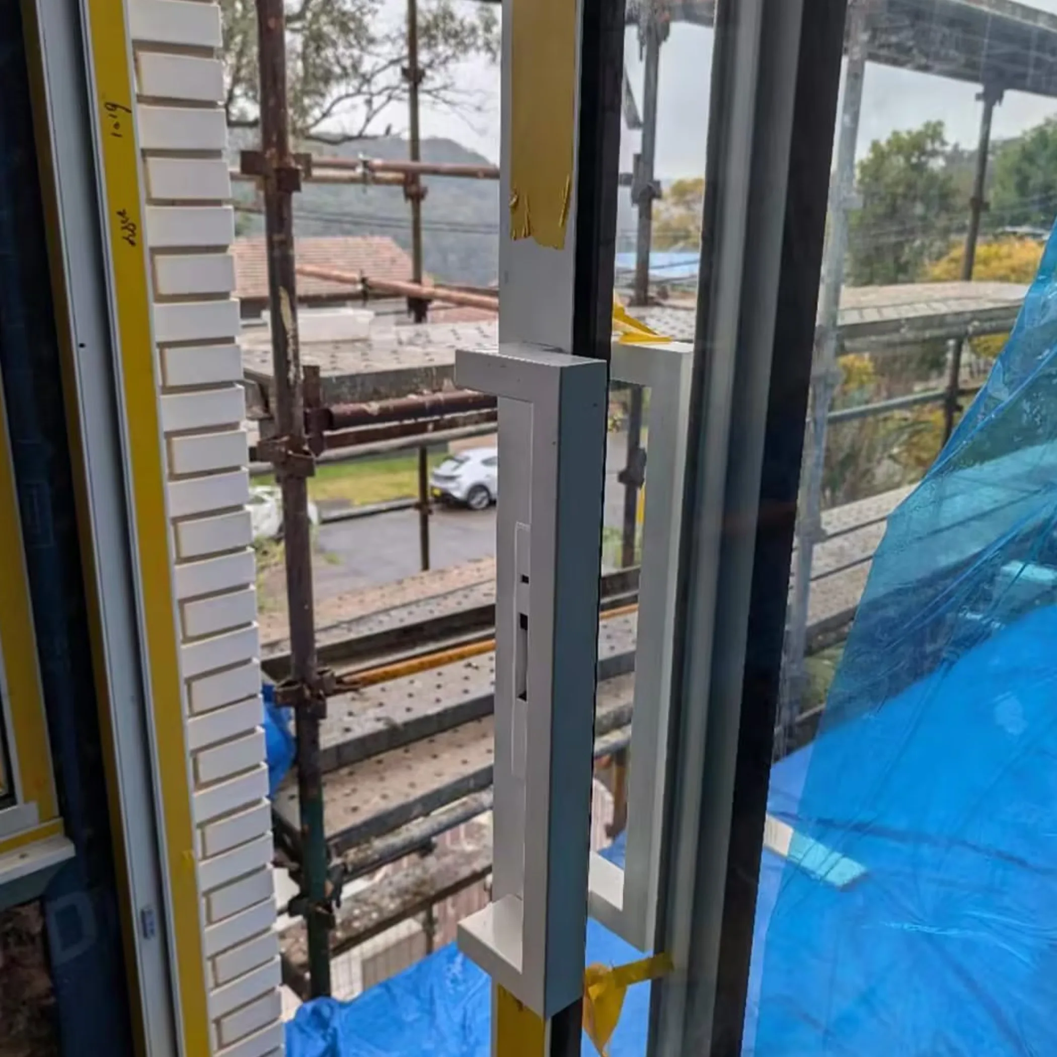 sliding door handle under construction