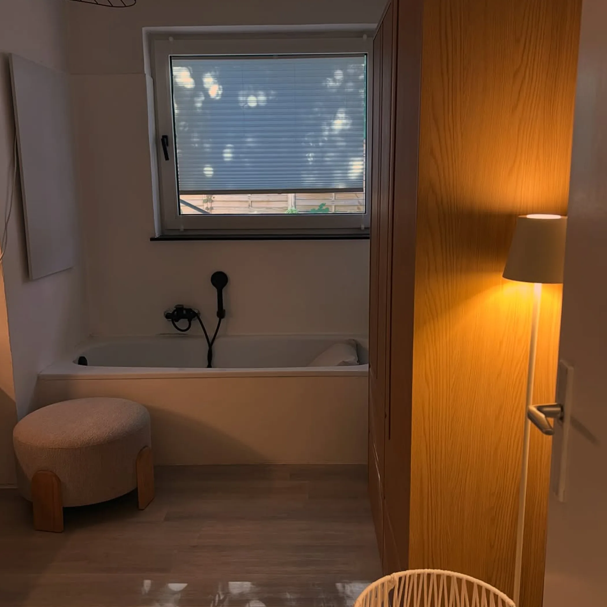 warm, well-lit bathtub bathroom